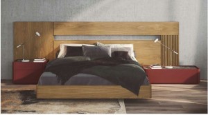 Dormitorio cama mantas y madera